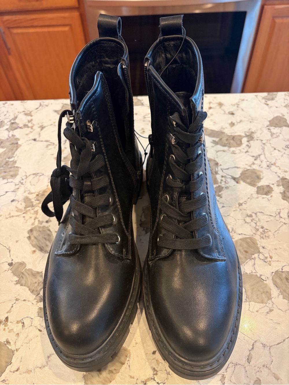 Ladies Madden Girl black boots. Side zip